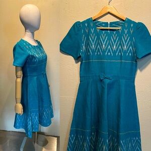 Vtg turquoise New Mexican/southwestern fiesta dress with Chimayo style pattern.